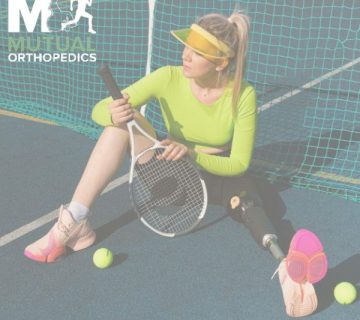 A woman with a prosthetic leg sits on a tennis court with a racket and tennis balls, wearing a visor and neon sportswear "Mutual Orthopedics" logo is visible in the corner