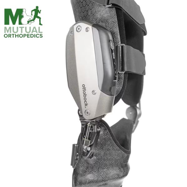 Close-up of an Ottobock orthotic leg brace with adjustable straps and metallic components, displayed next to the Mutual Orthopedics logo. Close up of an Ottobock orthotic leg brace with adjustable straps and metallic components, displayed next to the Mutual Orthopedics logo